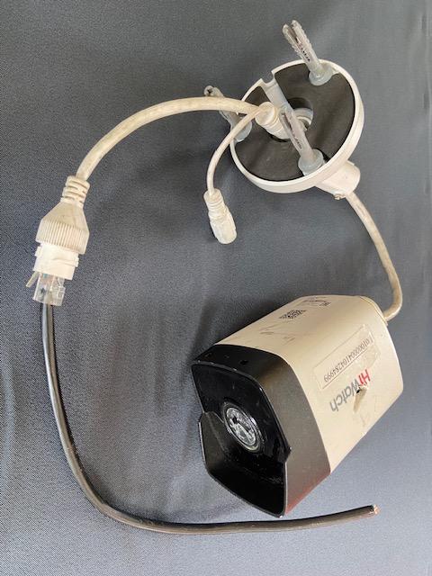 Видеокамера системы видеонаблюдения, поврежденная при ракетном обстреле (привезена из зоны СВО)